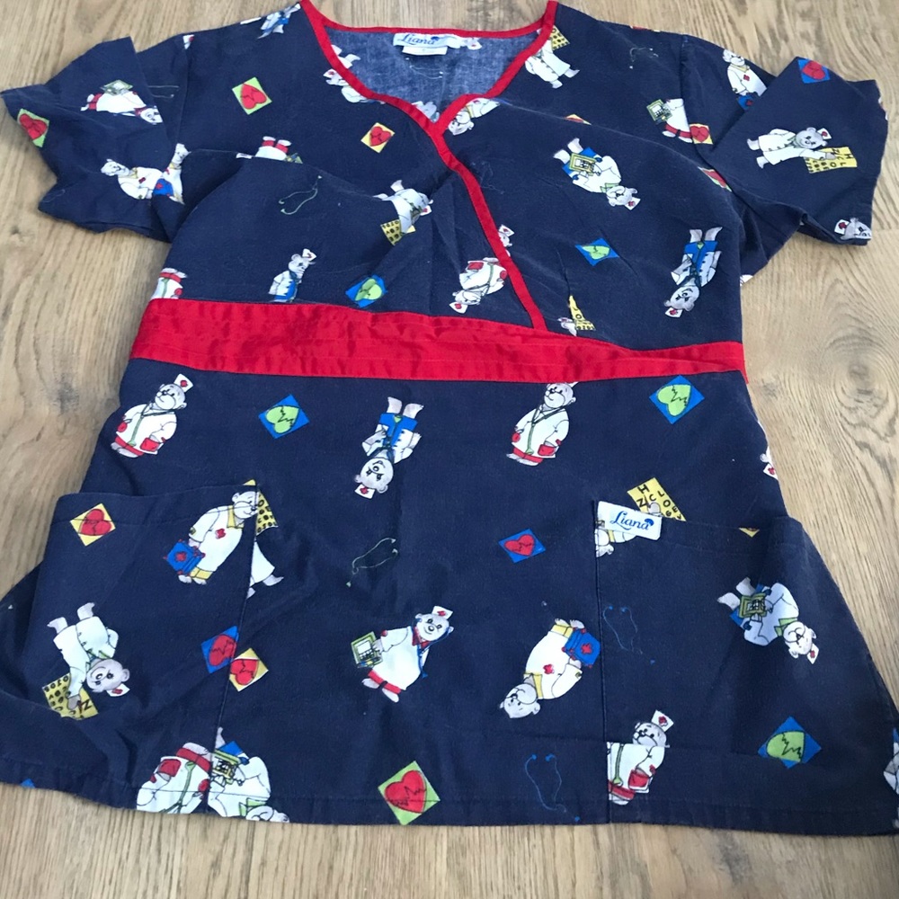 Navy blue tie in back scrub top with teddy bears